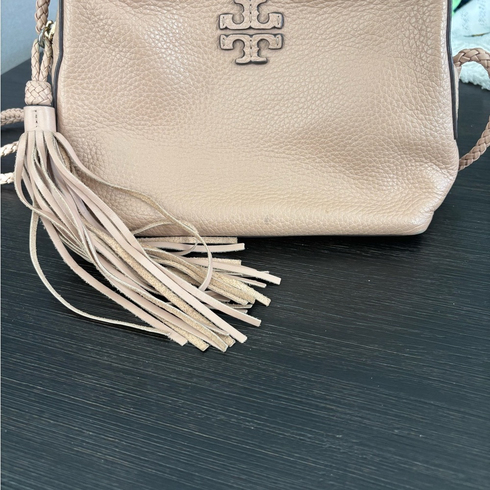 Tory Burch Pebbled Leather Tassel Crossbody in Blush Pink